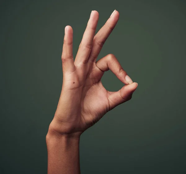 Youre Absolute Studio Shot Unrecognisable Woman Making Okay Gesture Green — Zdjęcie stockowe