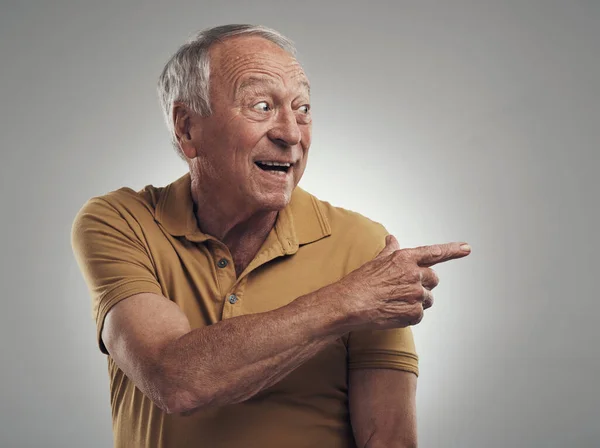 Went Way Studio Shot Elderly Man Pointing Something Smiling Grey — Zdjęcie stockowe
