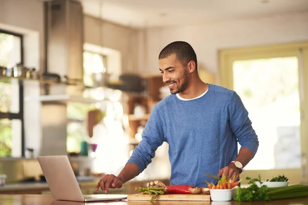 Technology Has Its Place Kitchen Shot Happy Young Man Using — Stockfoto