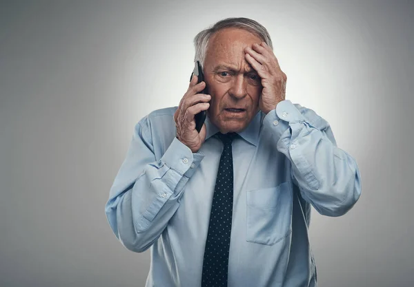 What Going Now Senior Businessman Standing Alone Grey Studio Background — Zdjęcie stockowe