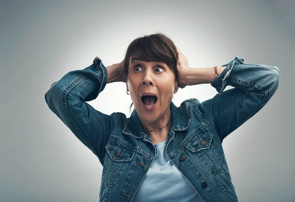 Driving Bonkers Studio Shot Senior Woman Looking Shocked Grey Background — Foto Stock