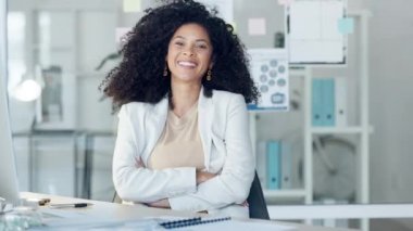 Happy, proud and confident female lawyer sitting with folded arms in her office smiling and laughing. Portrait of an African woman attorney leader ready to help relaxed in her workplace.