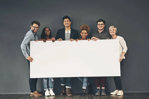 Group Professionals Holding Blank Board Sign Copy Space Grey Background — Stockfoto