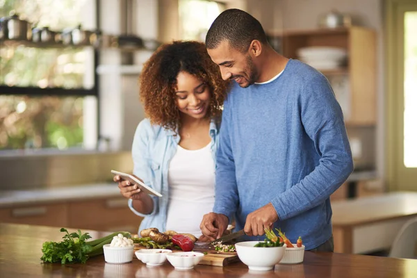Digitizing Diet Plan Shot Happy Young Couple Using Digital Tablet — Zdjęcie stockowe