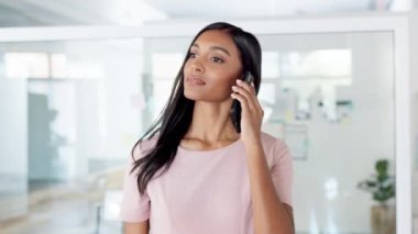 Businesswoman talking, smiling and holding phone while looking happy and cheerful in an office copy space background. Friendly corporate worker making a business call conversation to share good news.