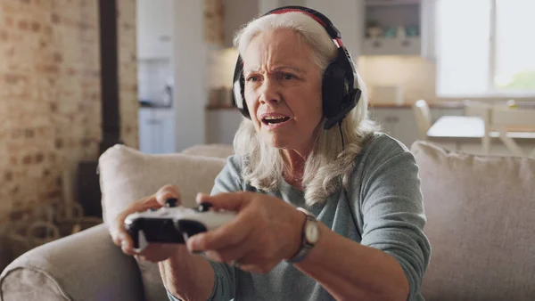 Game Makes Sense Senior Woman Sitting Alone Sofa Home Wearing — Stock Fotó