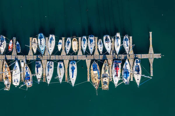 Life at sea is a whole new experience. High angle shot of boats at a seaside harbour