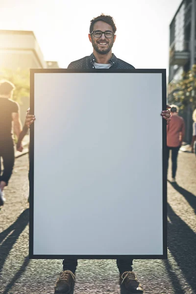 Young Man Holding Empty Sign Board Placard While Standing City — 스톡 사진