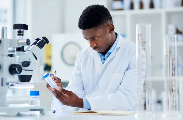 Right Stuff Focused Young Male Scientist Writing Labels Test Tubes — Stockfoto