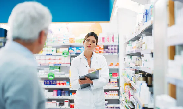 What Symptoms You Have Pharmacist Assisting Customer Chemist — Stock fotografie