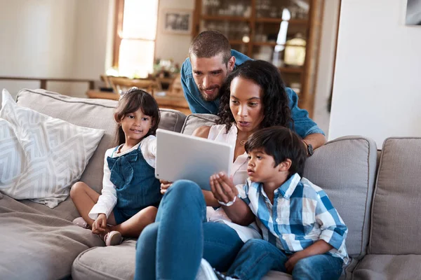 Enjoy Watching Videos Online Family Four Watching Something Digital Tablet — Zdjęcie stockowe