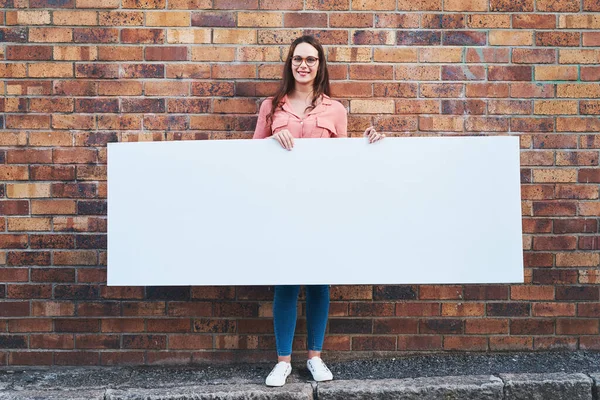 Signage Doesnt Get Bigger Young Woman Holding Blank Banner Urban — Stockfoto