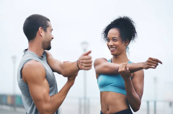 Motivating Each Other Better Two Sporty Young People Stretching While — 图库照片