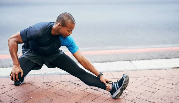 Can Never Stress Importance Stretching Full Length Shot Handsome Young — Stockfoto