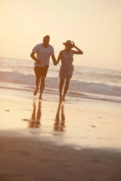 Even Waves Pull You Mature Couple Running Beach — Stockfoto