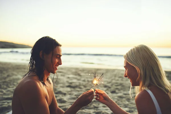 Bright Our Future Happy Young Couple Having Fun Lighting Sparklers — Fotografia de Stock