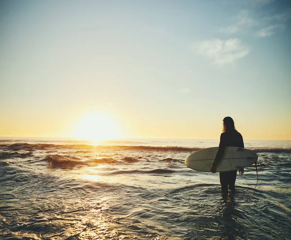 Surfing Days Here Rearview Shot Young Man Carrying Surfboard Beach — Foto Stock