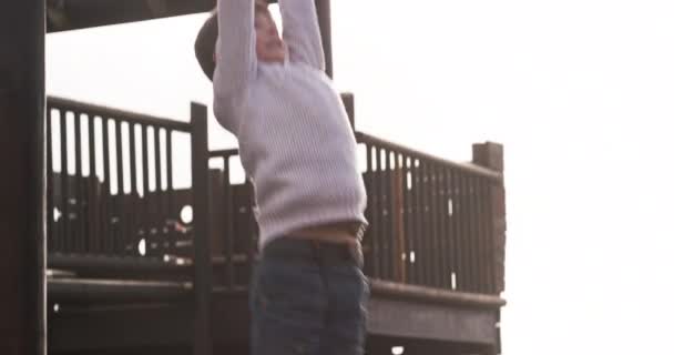 Fun Carefree Active Little Boy Playing Monkey Bars Outdoors Playground — 비디오