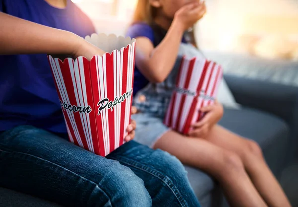 Digging Right Two Unrecognizable Young Children Sitting Sofa Eating Popcorn — ストック写真