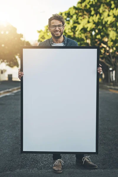 Happy Young Man Holding Copy Space Poster Outdoors Smiling Guy — 스톡 사진