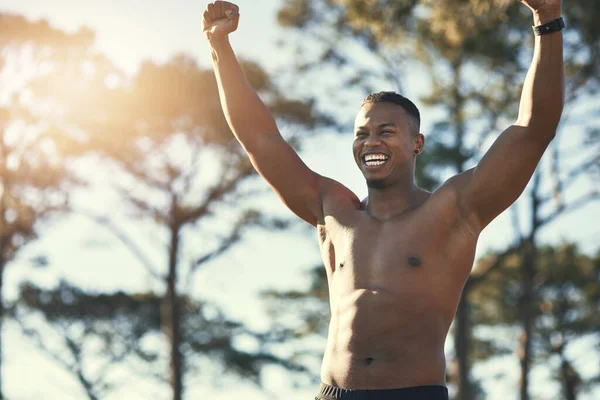 Champion Handsome Young Man Standing His Hands Raised While Exercising — Stockfoto