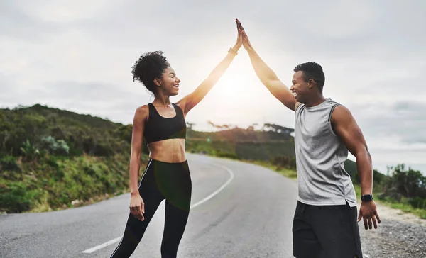 Motivation Runs High Sporty Young Couple High Fiving Each Other — Stok fotoğraf