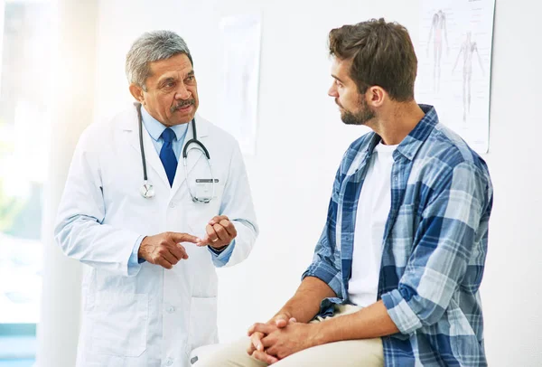 How You Feeling Today Confident Mature Male Doctor Consulting Patient — Foto Stock