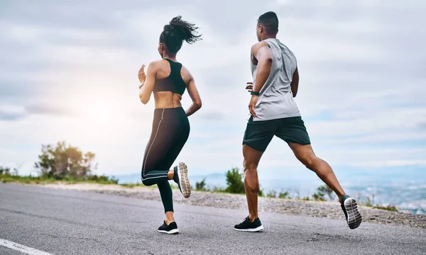 Keep Chasing Those Goals Rearview Shot Sporty Young Couple Exercising — Stok fotoğraf