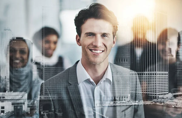 These guys have your back. Portrait of confident young business people standing with their arms folded inside of the office at work during the day