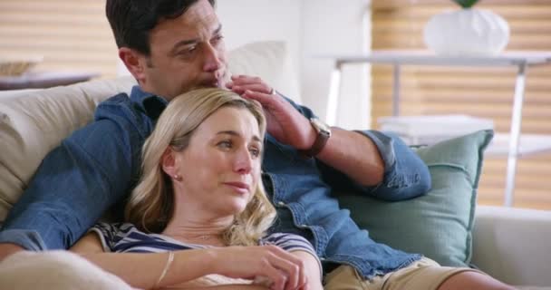 Sad Couple Crying Watching Movie Bonding Sofa Home Husband Wife — Vídeo de Stock