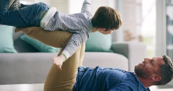 Playful Boy Playing His Father While Pretending Fly Plane Superhero — Vídeos de Stock