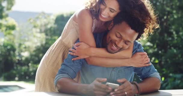 Affectionate Happy Loving Wife Surprises Her Husband While Relaxing Outdoors — Stockvideo