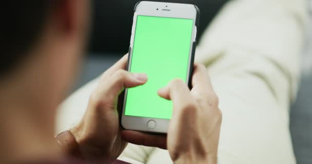 Hands Using Phone Showing Green Screen Copy Space Man Browsing — Stockvideo