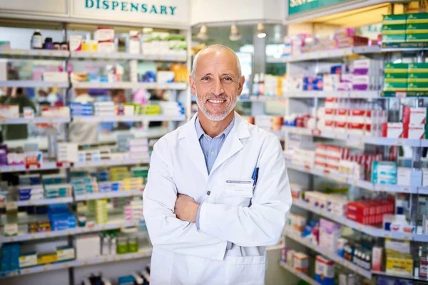 Here to help give your health the boost it needs. Portrait of a mature pharmacist working in a chemist