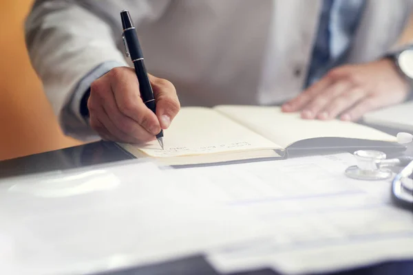 Checking His Schedule Unrecognizable Male Doctor Writing His Diary While —  Fotos de Stock