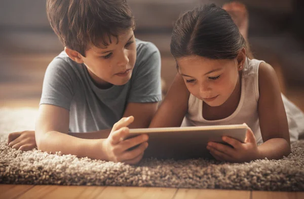 Technologys Youngest Fans Adorable Brother Sister Using Digital Tablet Together — Zdjęcie stockowe