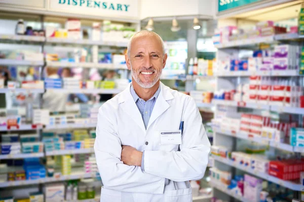 Pop around for trusted medical advice. Portrait of a mature pharmacist working in a chemist