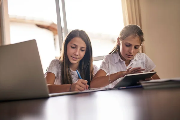 Doing Our School Work Together Two Cheerful Young Girls Doing — Fotografia de Stock