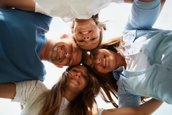 Were Together Low Angle Portrait Young Family Four Standing Huddle — Stockfoto