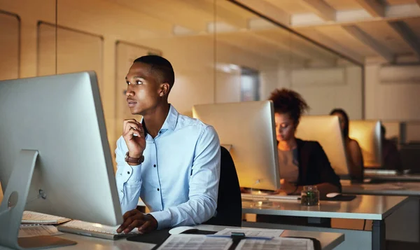 Here Beat Deadline Young Businessman Working Late Computer Office — Stock Fotó