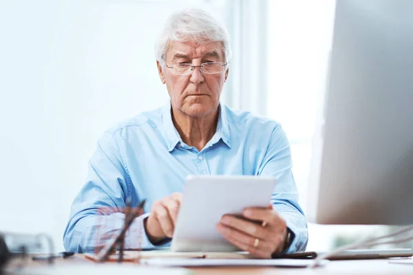 Taking Closer Look Details Handsome Senior Businessman Working Tablet Home —  Fotos de Stock