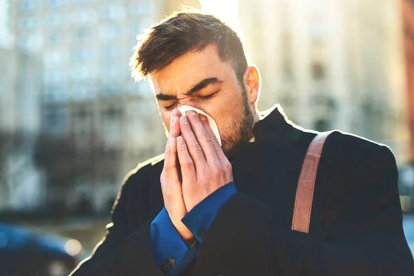 Hope Cold Wont Stop Working Irritated Looking Young Man Blowing — Stock Photo, Image