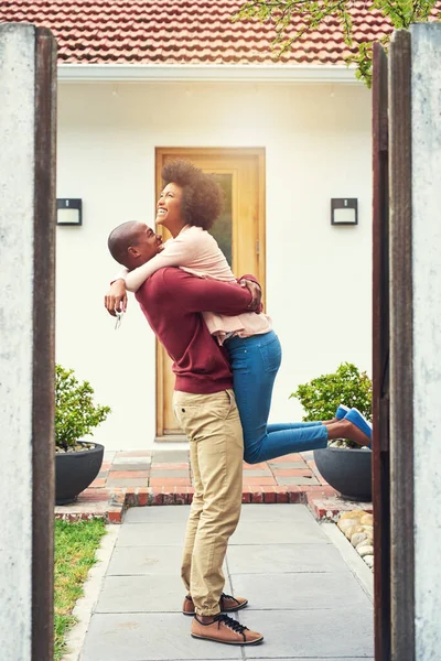 When a big dream turns into a reality. a young couple celebrating the move into their new house