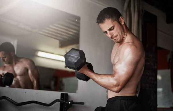 Form Equals Brawn Handsome Muscular Young Man Working Out Dumbbell — Foto de Stock