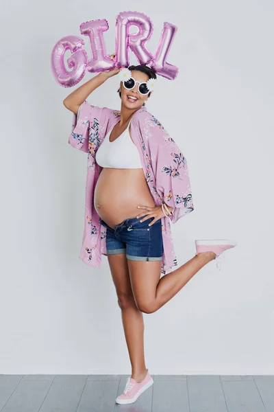 Its Girl Studio Shot Beautiful Young Pregnant Woman Holding Word — Foto Stock