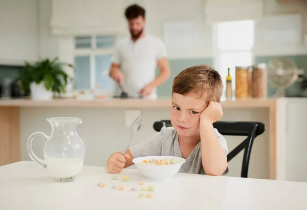 I did not order this. a little boy refusing to eat his breakfast at home