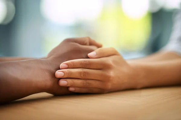 Together Two Unrecognizable People Holding Hands While Being Seated Table — Stockfoto