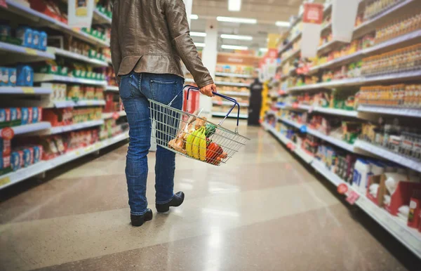 Stocking Staples Woman Holding Basket While Shopping Grocery Store — ストック写真