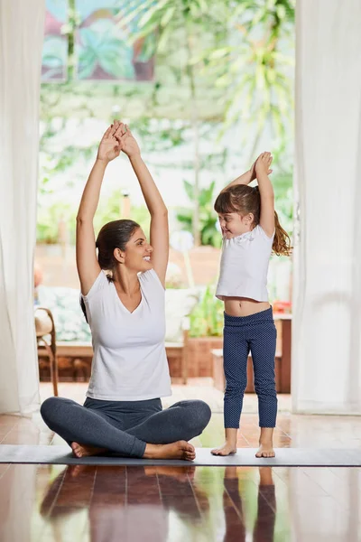 Aumbience Yoga & Wellness - Look at this mother daughter duo giving a  partner yoga pose a try!! Looking good ladies! This and other fun and  playful partner postures are coming your