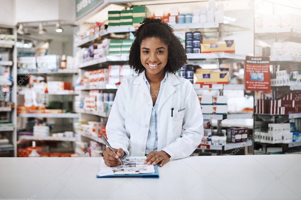 Just follow these instructions. Cropped portrait of an attractive young female pharmacist working in a pharmacy